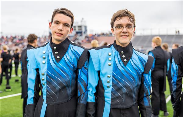 Two CHS band members smile